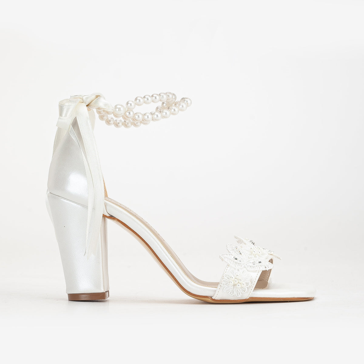 Helene - Ivory Lace Bridal Heels with Pearls – front three-quarter view showing pearl, lace, leather, Vowalisse
