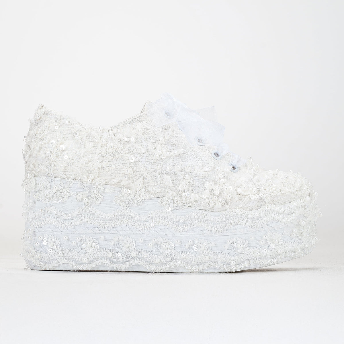 Florette - Ivory Lace Platform Bridal Sneakers – front three-quarter view showing lace, ivory, red, Vowalisse