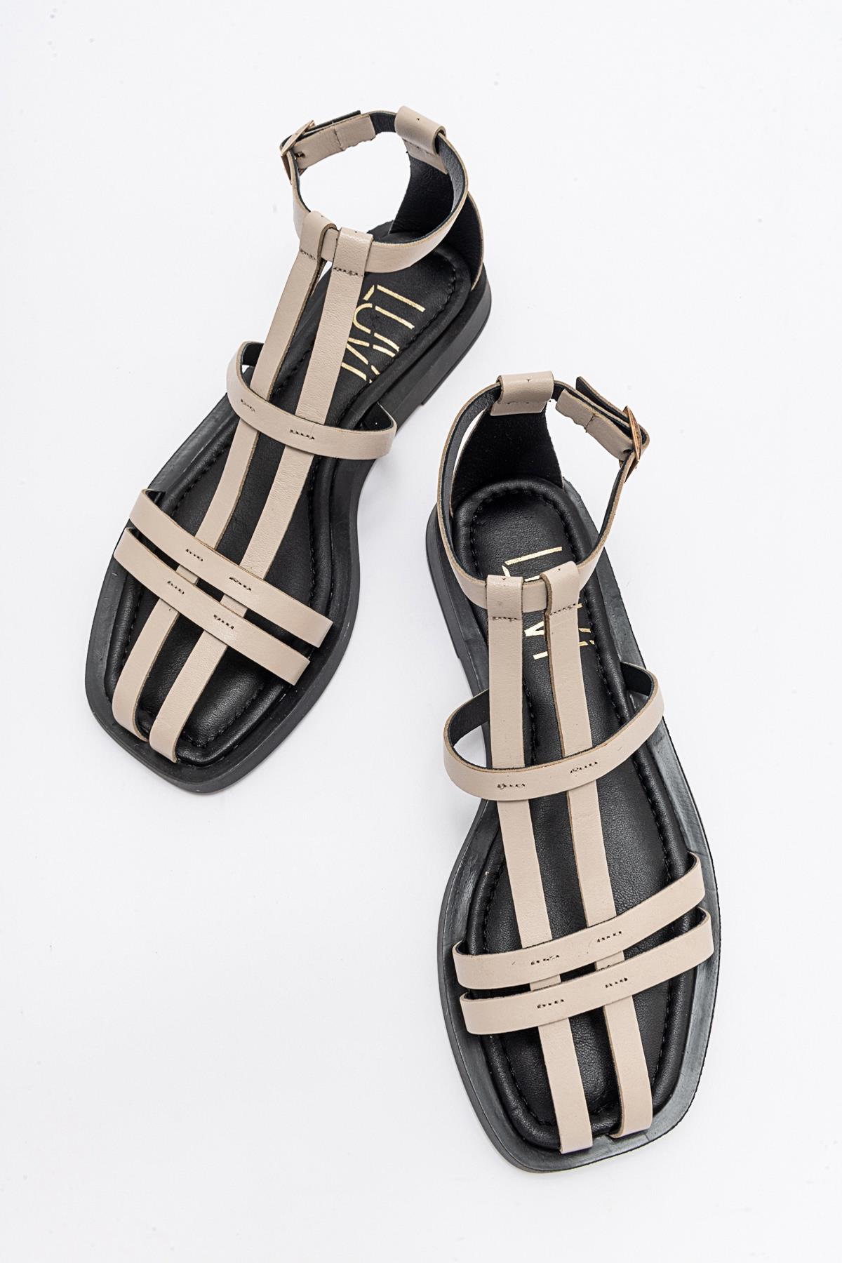 Odeil - Beige Leather Sandal – side view showing leather, Vowalisse