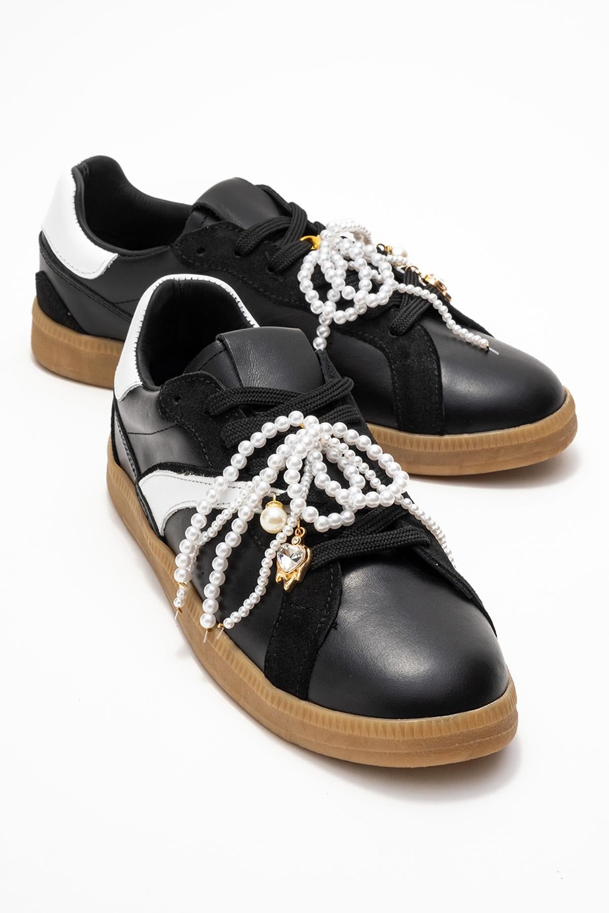 Taren - Black Genuine Leather Pearl Buckle Casual Sneaker – front three-quarter view showing pearl, leather, black…