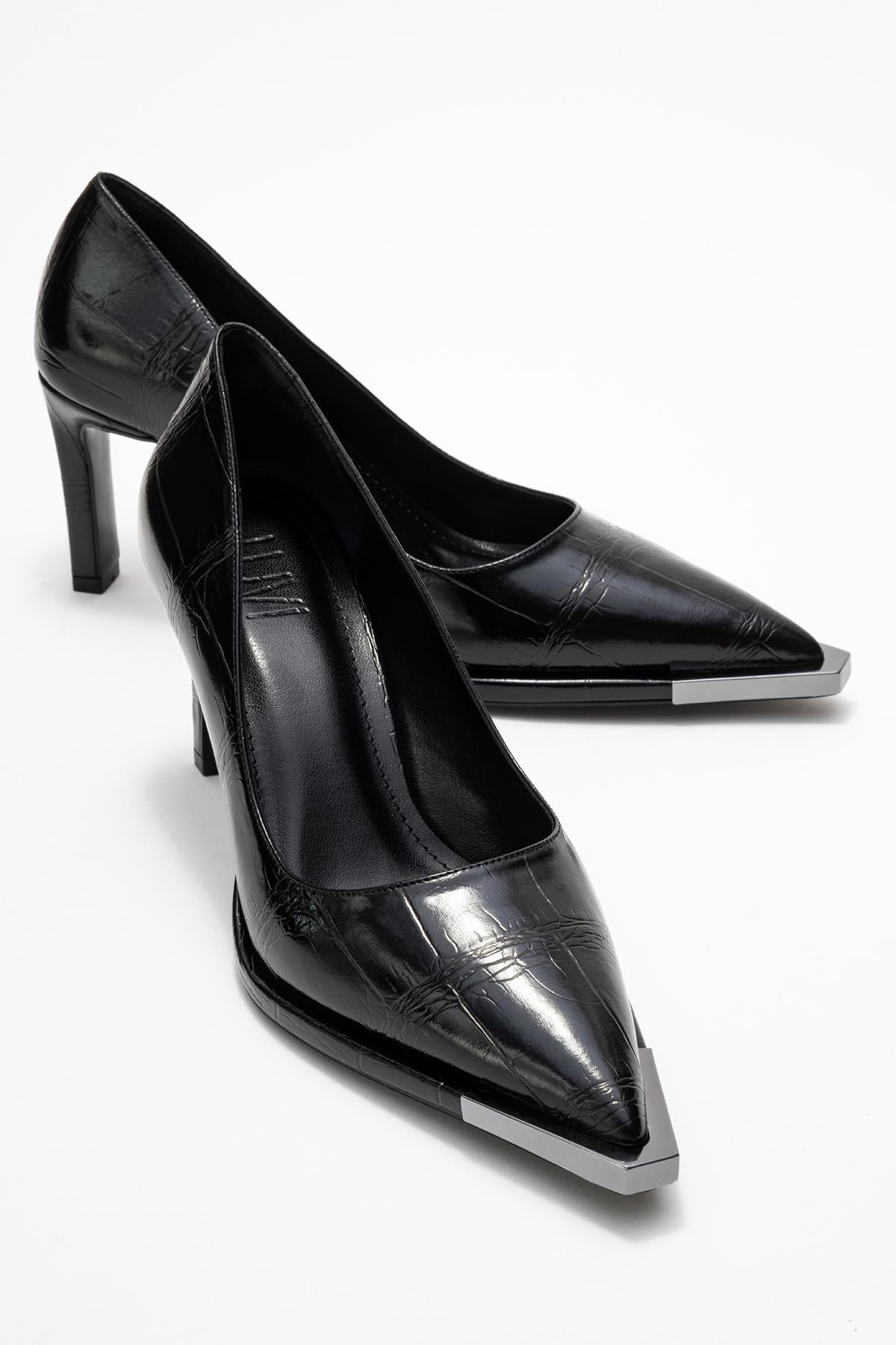 Liora - Black Printed Platinum-Detail Block Heel Pump – front three-quarter view showing leather, metallic, black…