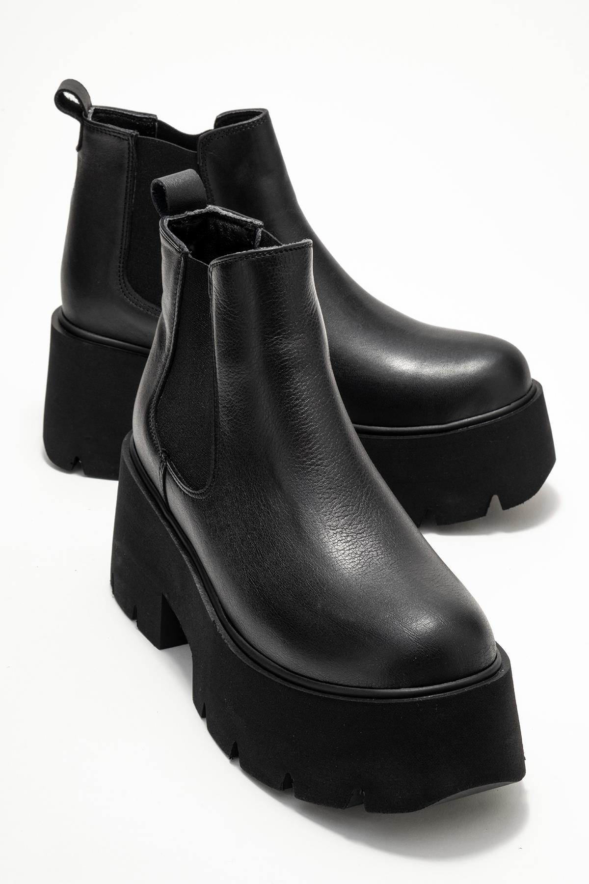 Clen - Black Genuine Leather Elastic-Panel Chunky Platform Boot – front three-quarter view showing leather, black…