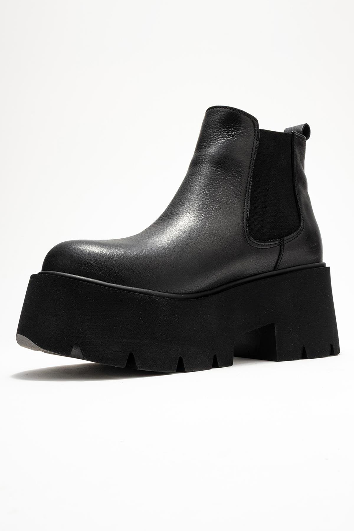 Clen - Black Genuine Leather Elastic-Panel Chunky Platform Boot – heel view showing leather, black, Vowalisse