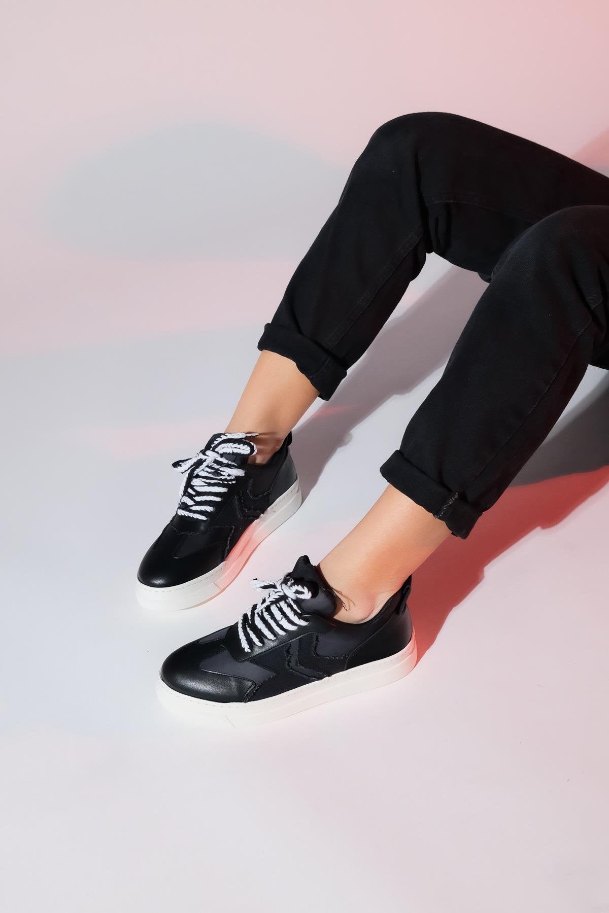 Sande - Black Denim Detail Sport Sneaker – detail view showing leather, black, Vowalisse