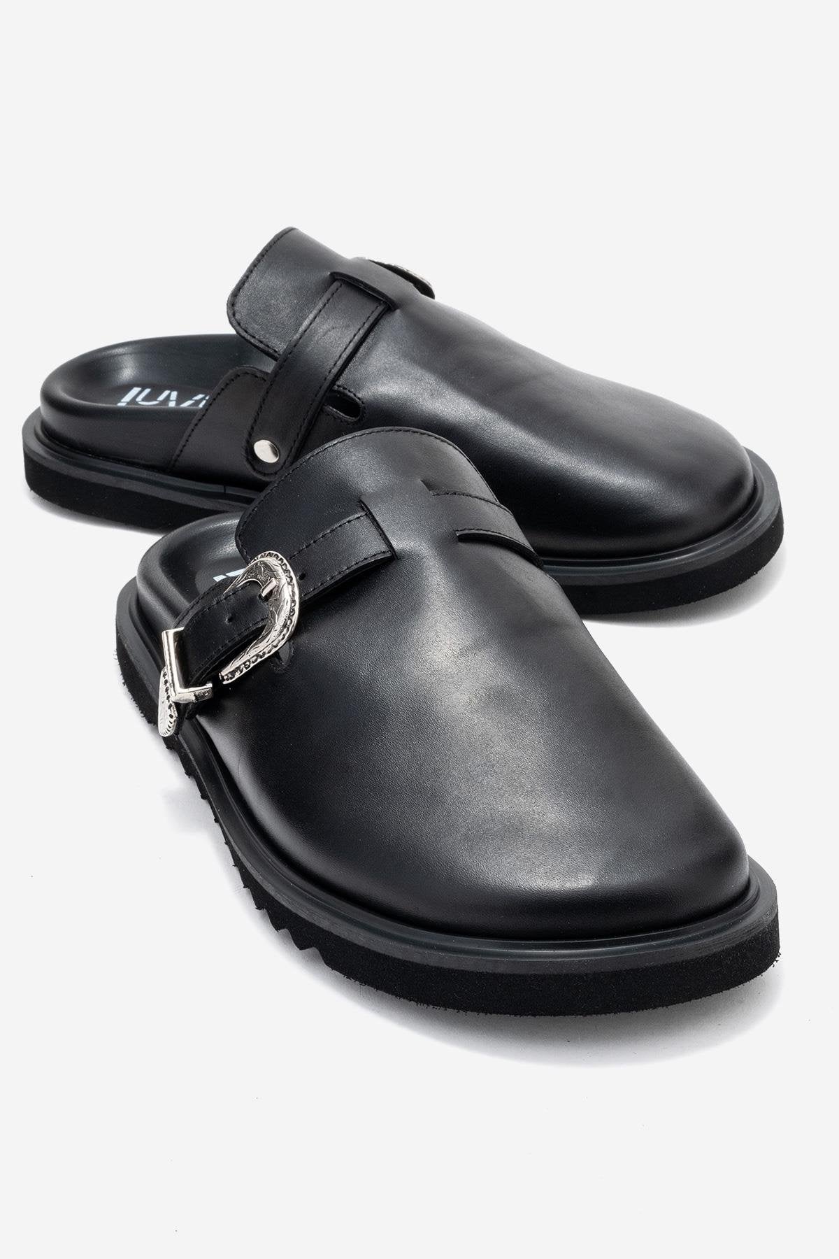 Vesta - Black Buckled Genuine Leather Closed-Toe Mule – front three-quarter view showing leather, black, Vowalisse