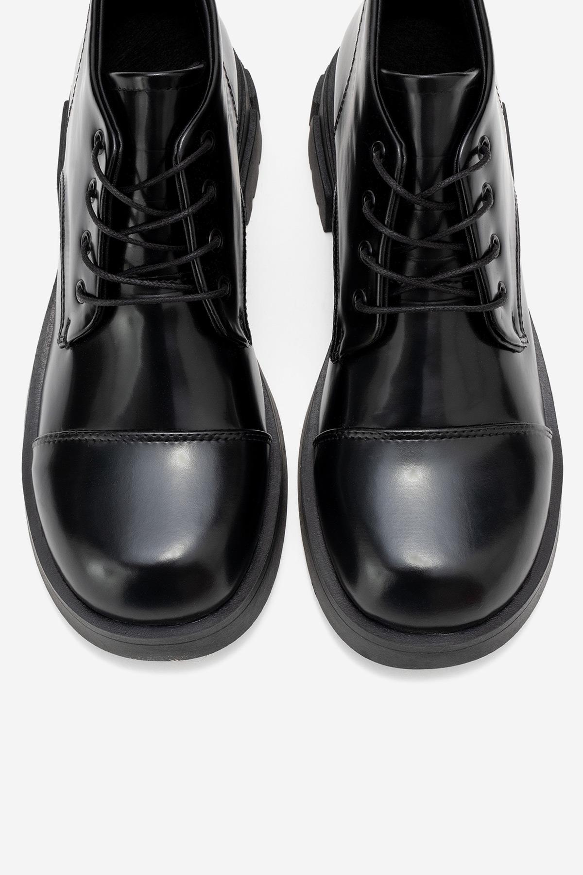 Lagom - Black Ankle Boot – side view showing leather, black, red, Vowalisse
