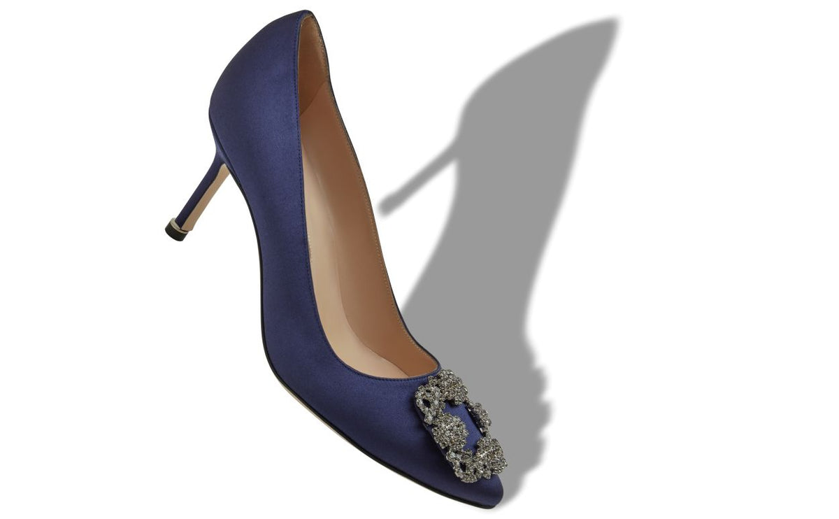 Delphine Belle Blue Jewel Buckle Pumps – front three-quarter view showing blue jewel buckle, crystal buckle, almond toe…
