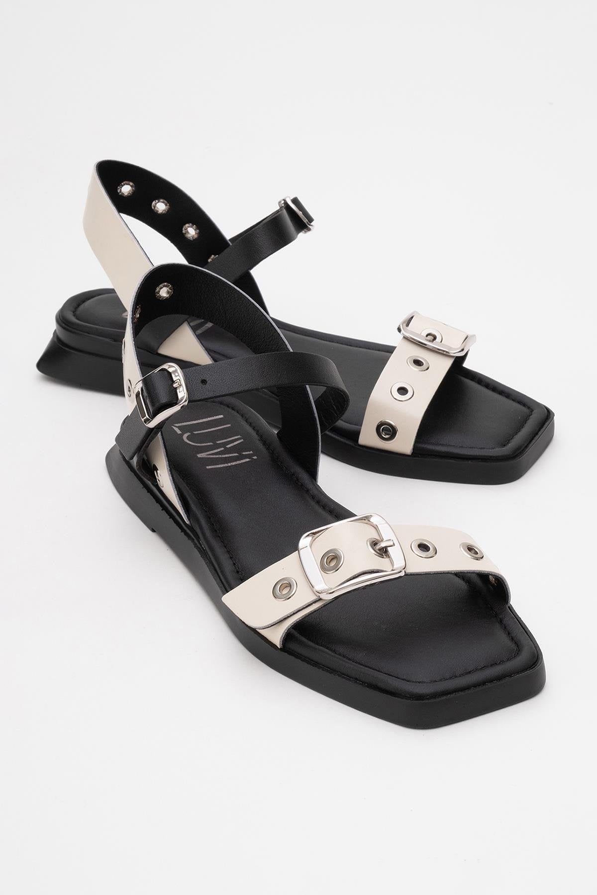 Mozes - Beige Black Leather Sandal – front three-quarter view showing leather, black, Vowalisse