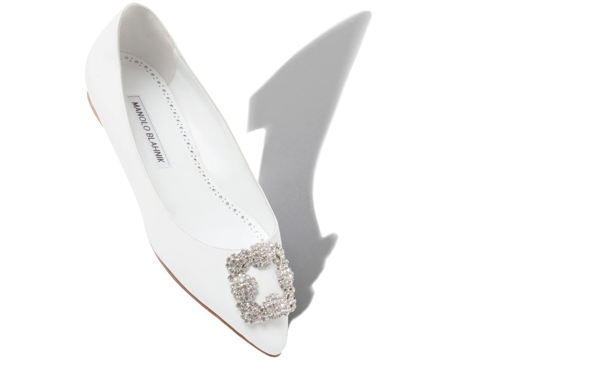 Juliette Dawn White Jewel Buckle Pumps – front three-quarter view showing white jewel buckle, crystal buckle, almond toe…