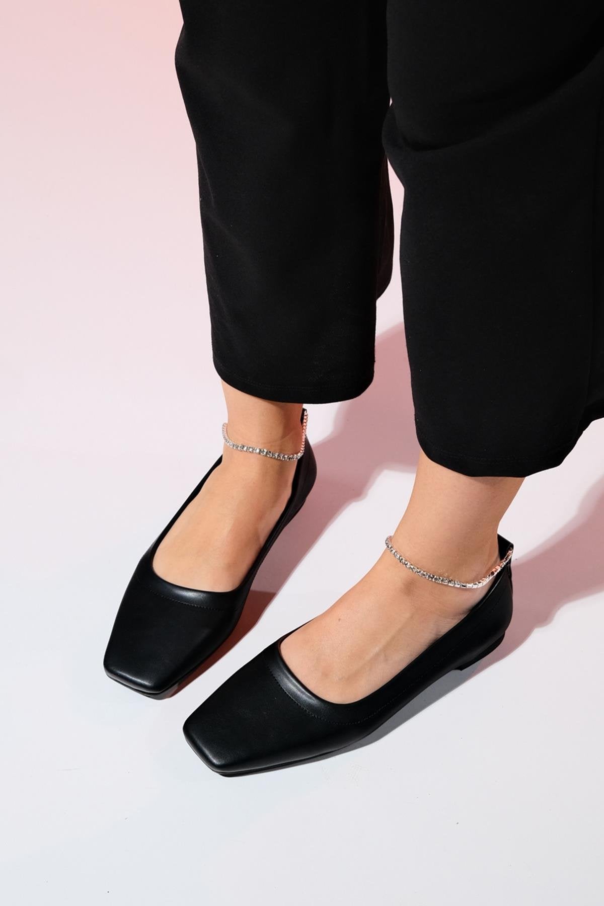 Pohan - Black Genuine Leather Stone-Embellished Ballet Flat – front three-quarter view showing leather, black, Vowalisse
