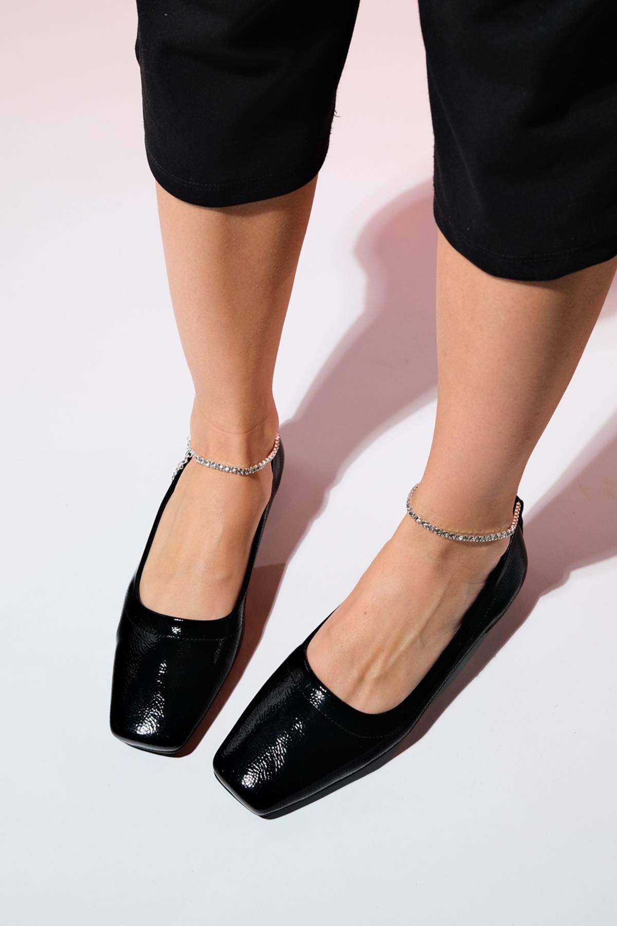 Pohan - Black Genuine Leather Patent Stone-Embellished Ballet Flat – front three-quarter view showing leather, black…