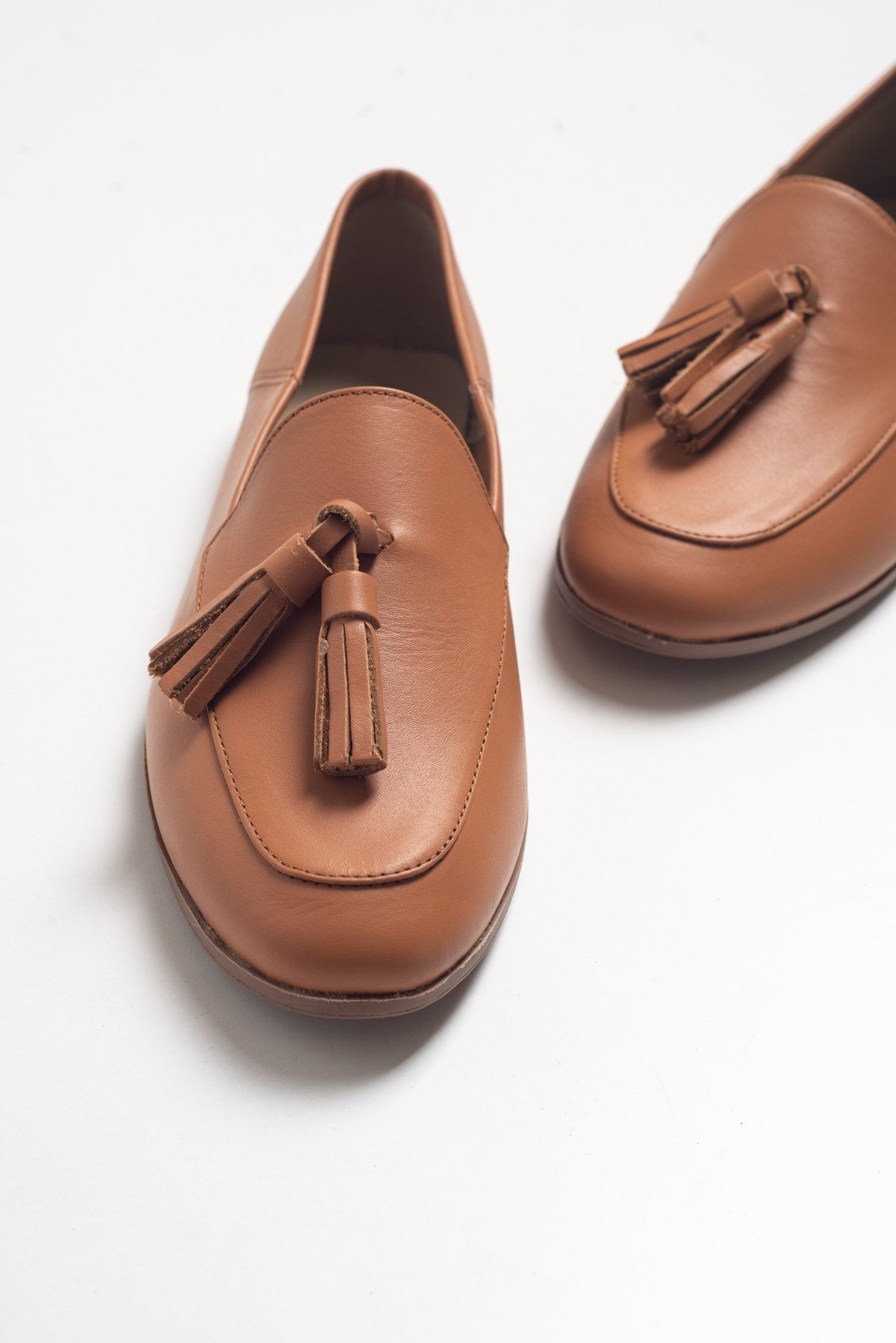 F04 - Cognac Genuine Leather Tassel Loafer – side view showing leather, Vowalisse