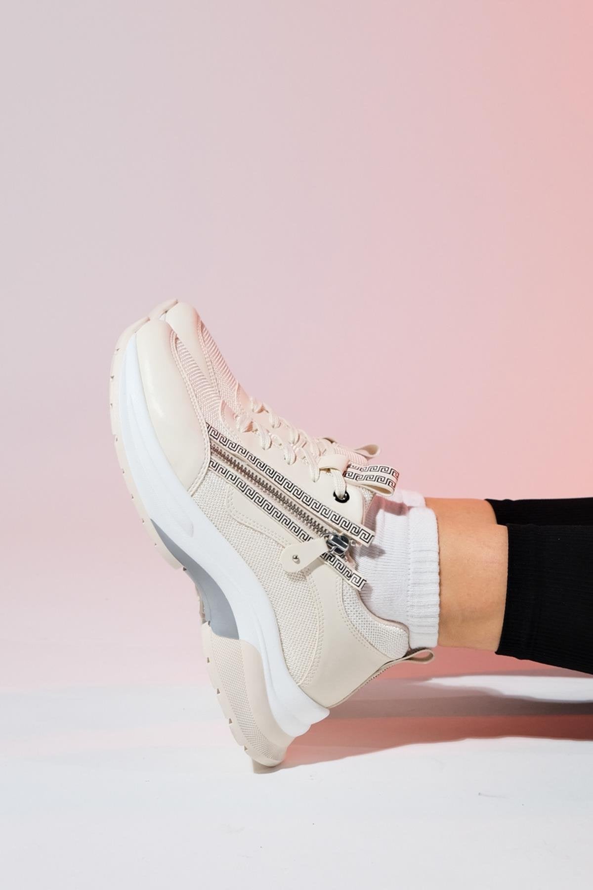 Oude - Ecru Zippered Platform Sneaker – detail view showing leather, red, Vowalisse