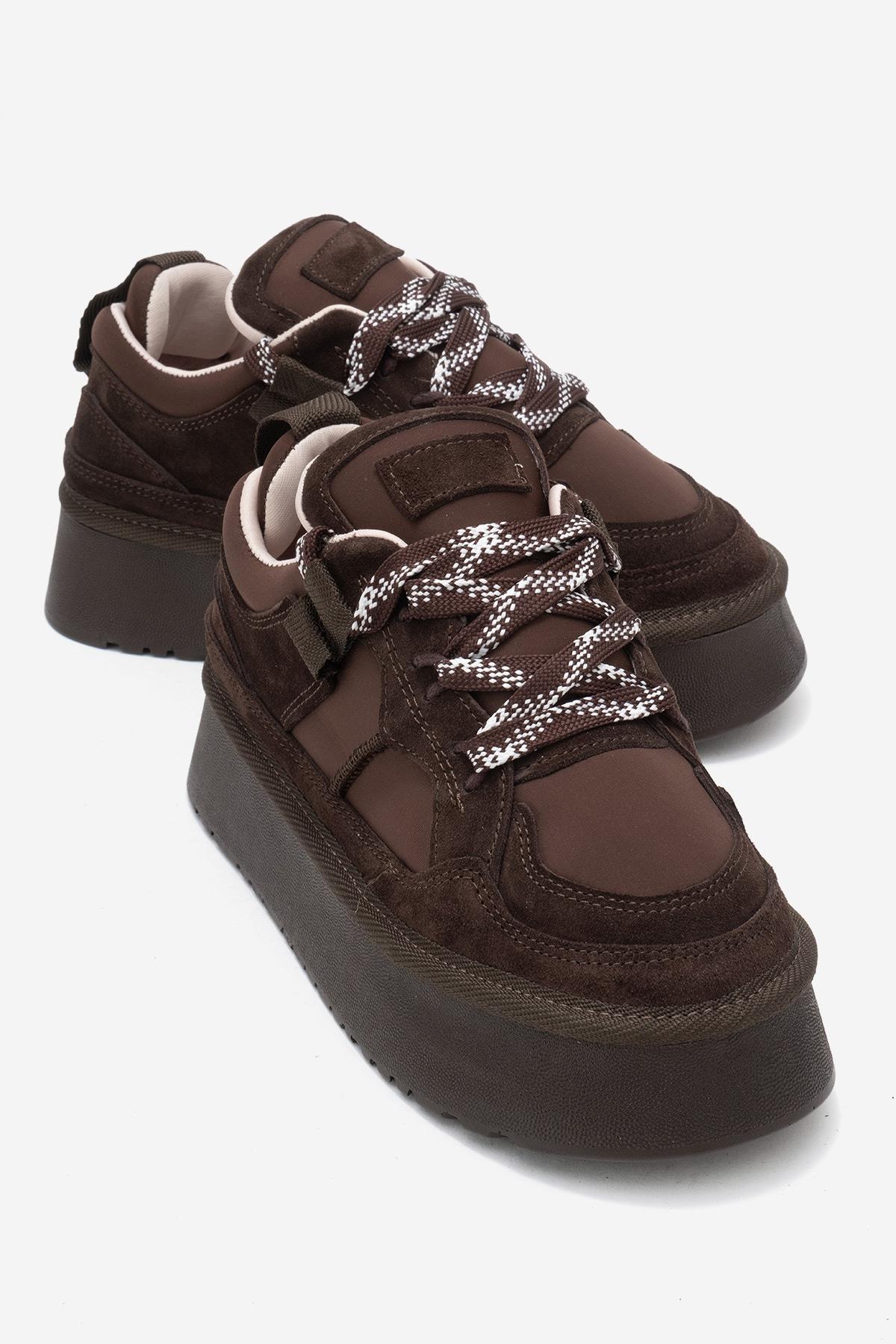 Riven - Brown Genuine Leather Platform Sneaker – front three-quarter view showing leather, suede, Vowalisse
