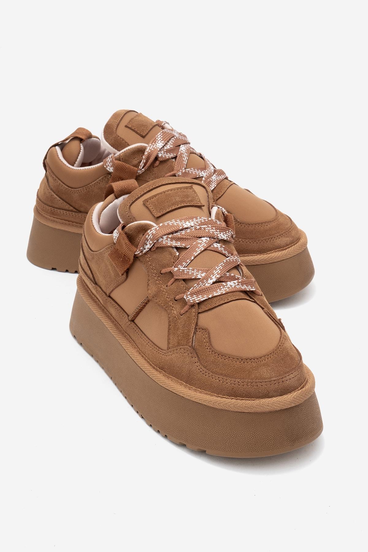 Riven - Cognac Genuine Leather Platform Sneaker – front three-quarter view showing leather, suede, Vowalisse