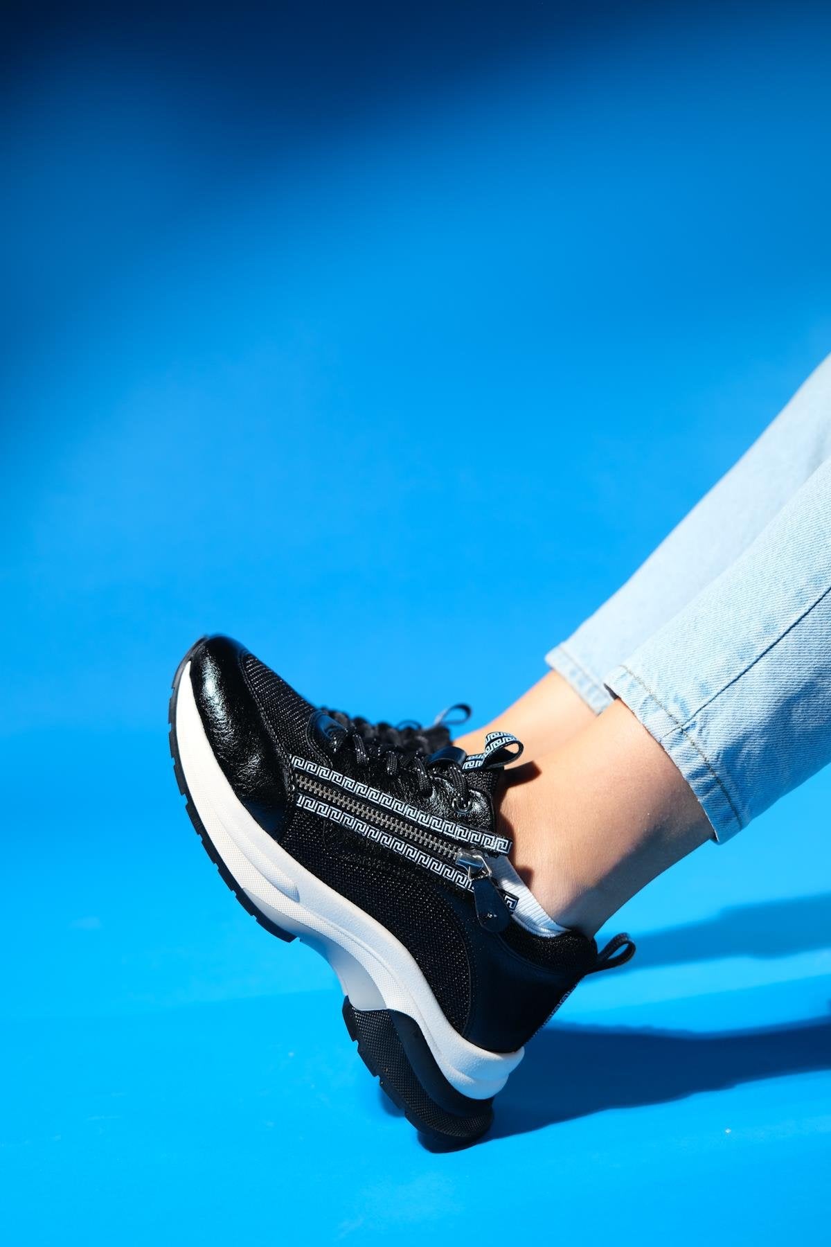 Oude - Black Zippered Platform Sneaker – back view showing leather, black, red, Vowalisse