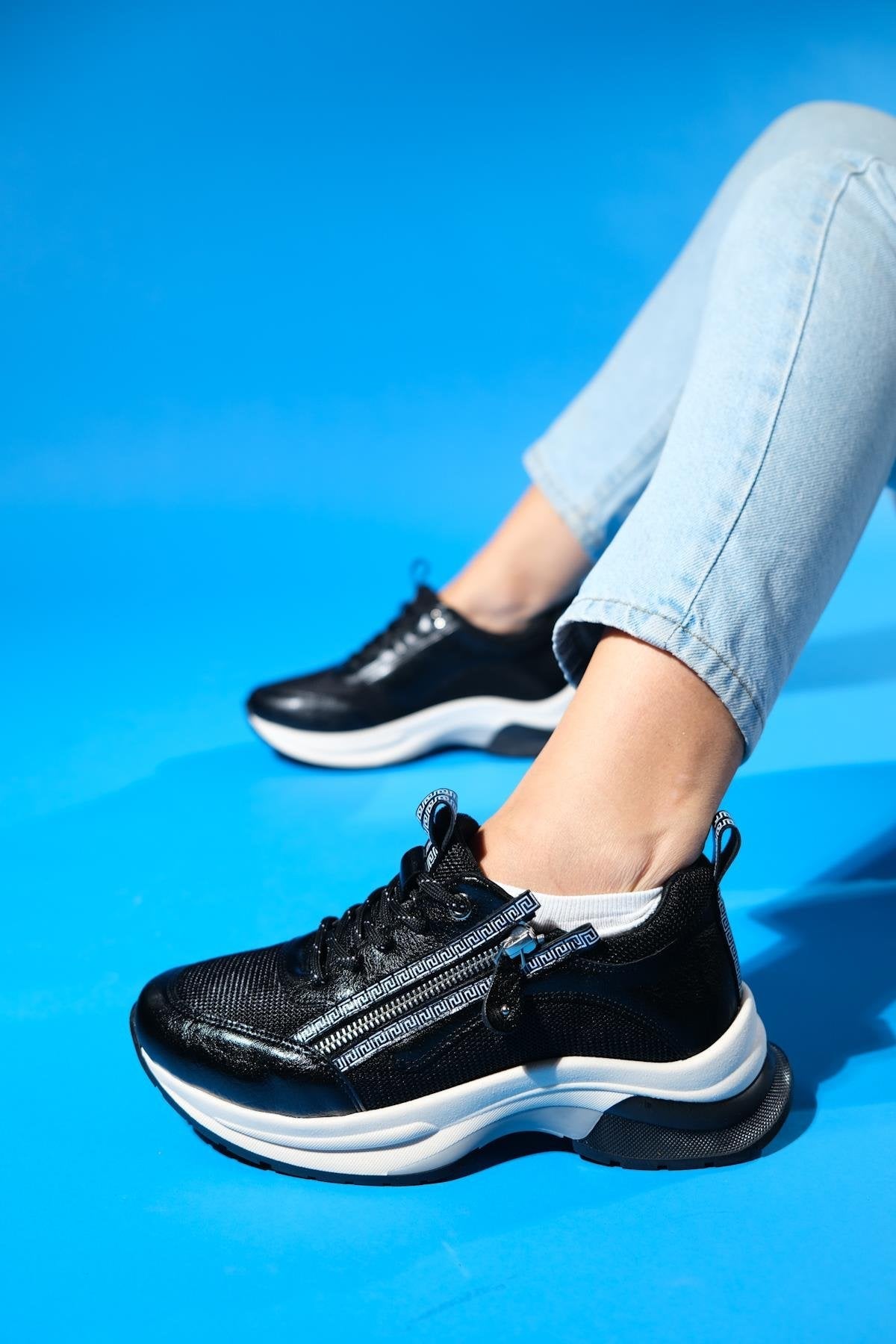 Oude - Black Zippered Platform Sneaker – top view showing leather, black, red, Vowalisse
