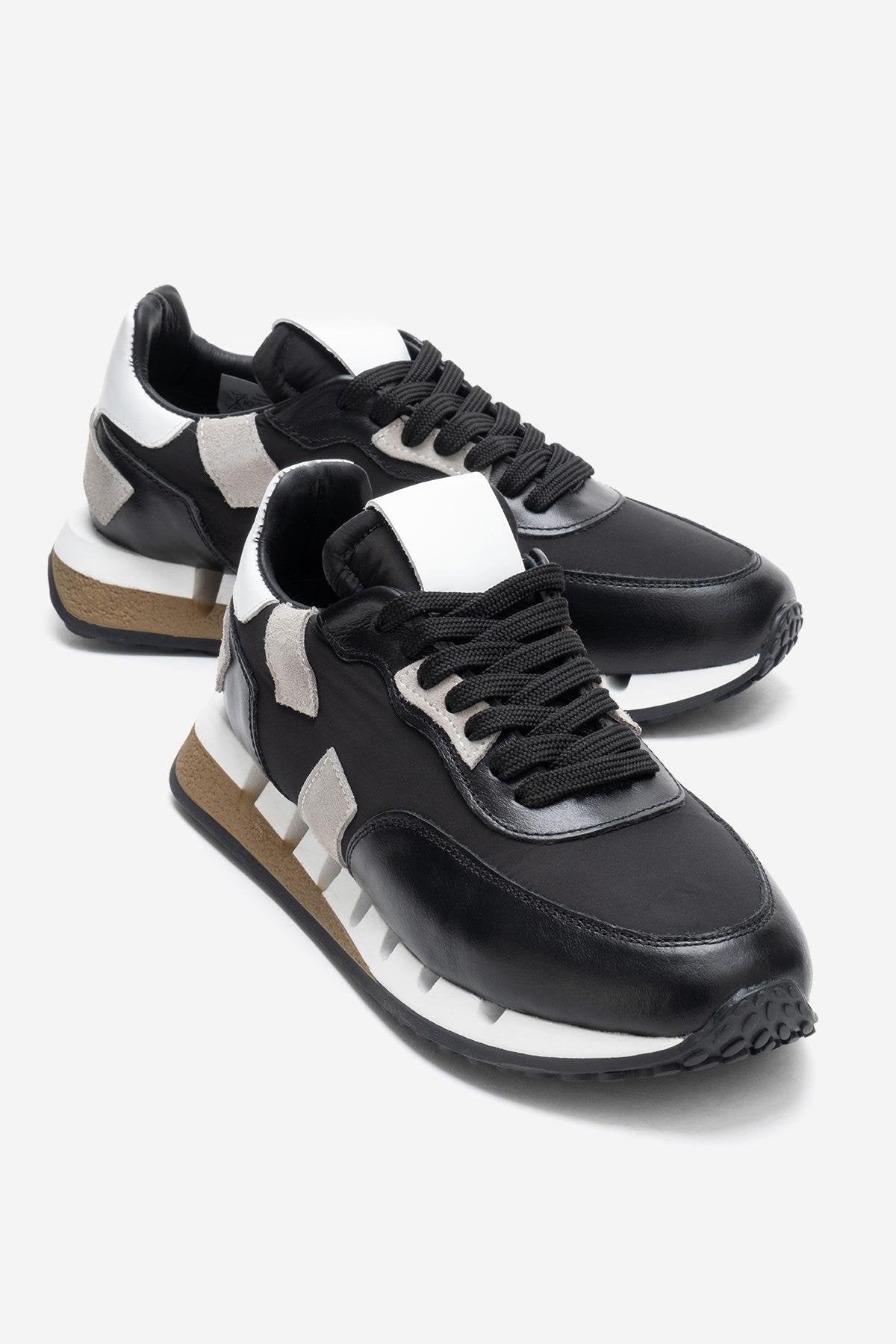 VIAN - Black Genuine Leather Sneaker – front three-quarter view showing leather, black, Vowalisse