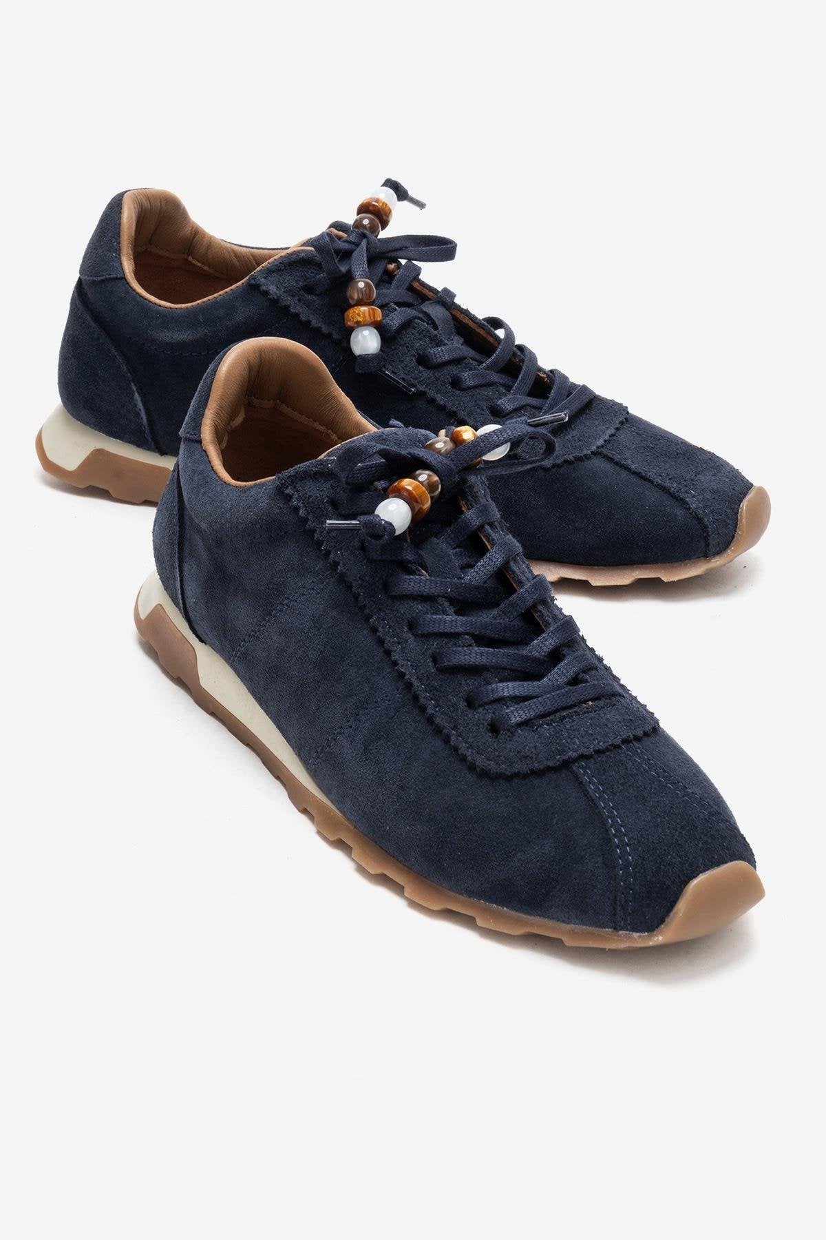 BREA - Navy Genuine Suede Leather Sneaker – front three-quarter view showing leather, suede, Vowalisse