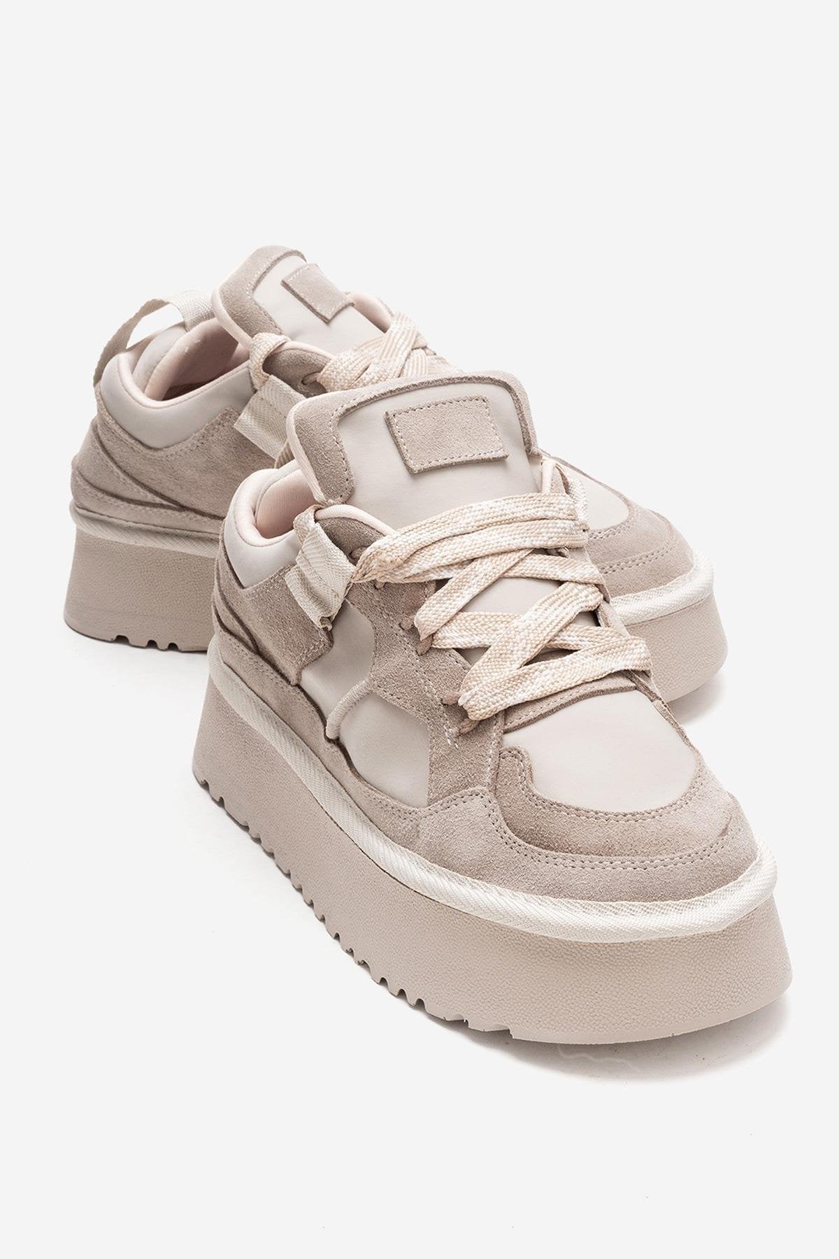 RIVEN - Beige Genuine Leather Platform Sneaker – front three-quarter view showing leather, suede, Vowalisse