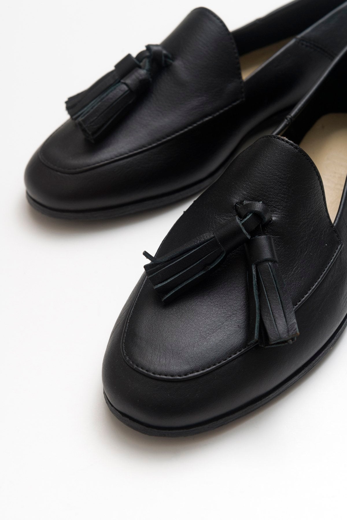 Mona - Black Soft Leather Tassel Loafers – side view showing leather, suede, black, Vowalisse