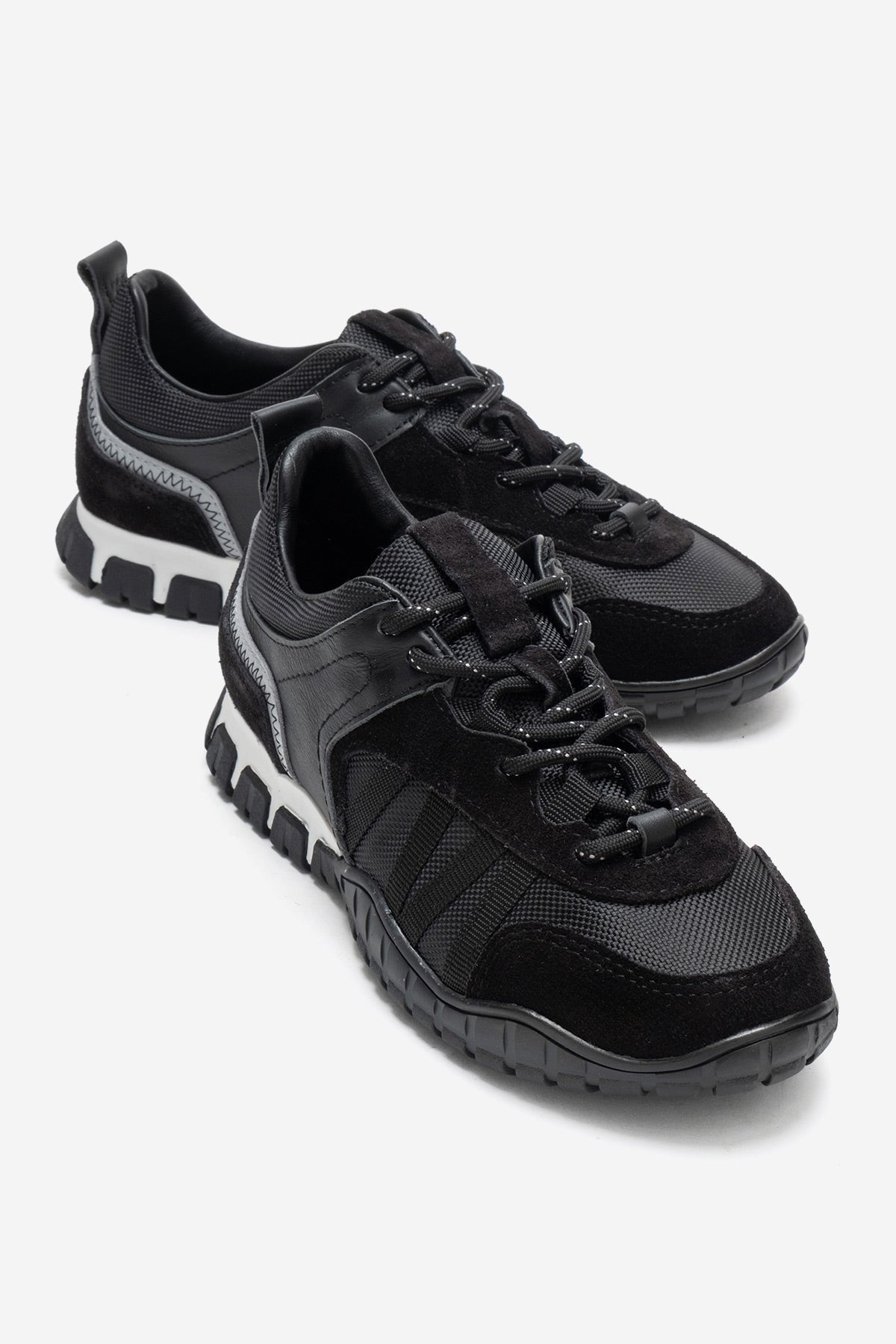 FIERA - Black Genuine Leather Sneaker – front three-quarter view showing leather, mesh, black, Vowalisse