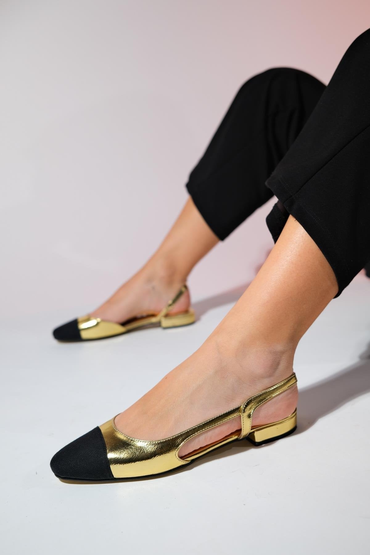 Lujo - Gold Backless Flat Ballerina – front three-quarter view showing leather, gold, Vowalisse
