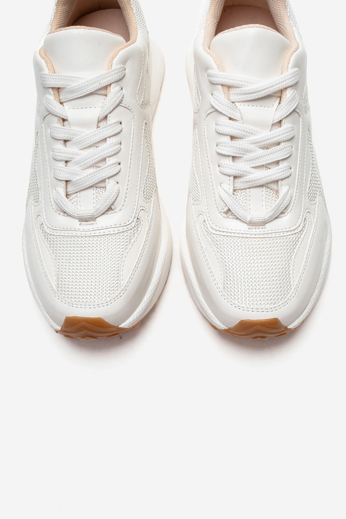PREMIA - White Leather Sneaker – front three-quarter view showing leather, white, Vowalisse