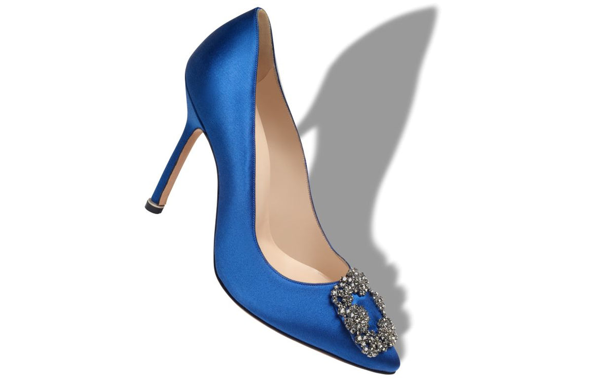 Delphine Pearl Blue Jewel Buckle Pumps – front three-quarter view showing blue jewel buckle, crystal buckle, almond toe…
