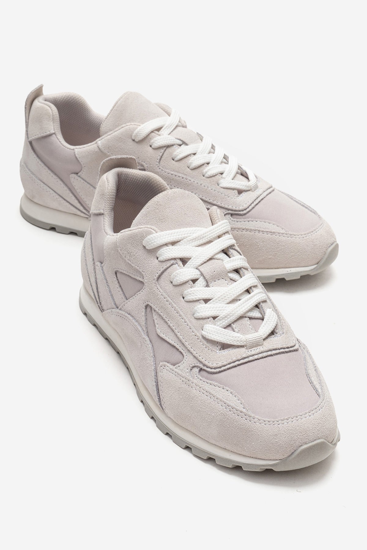 Sahra - Off-White Genuine Leather Sneaker – front three-quarter view showing leather, suede, white, Vowalisse