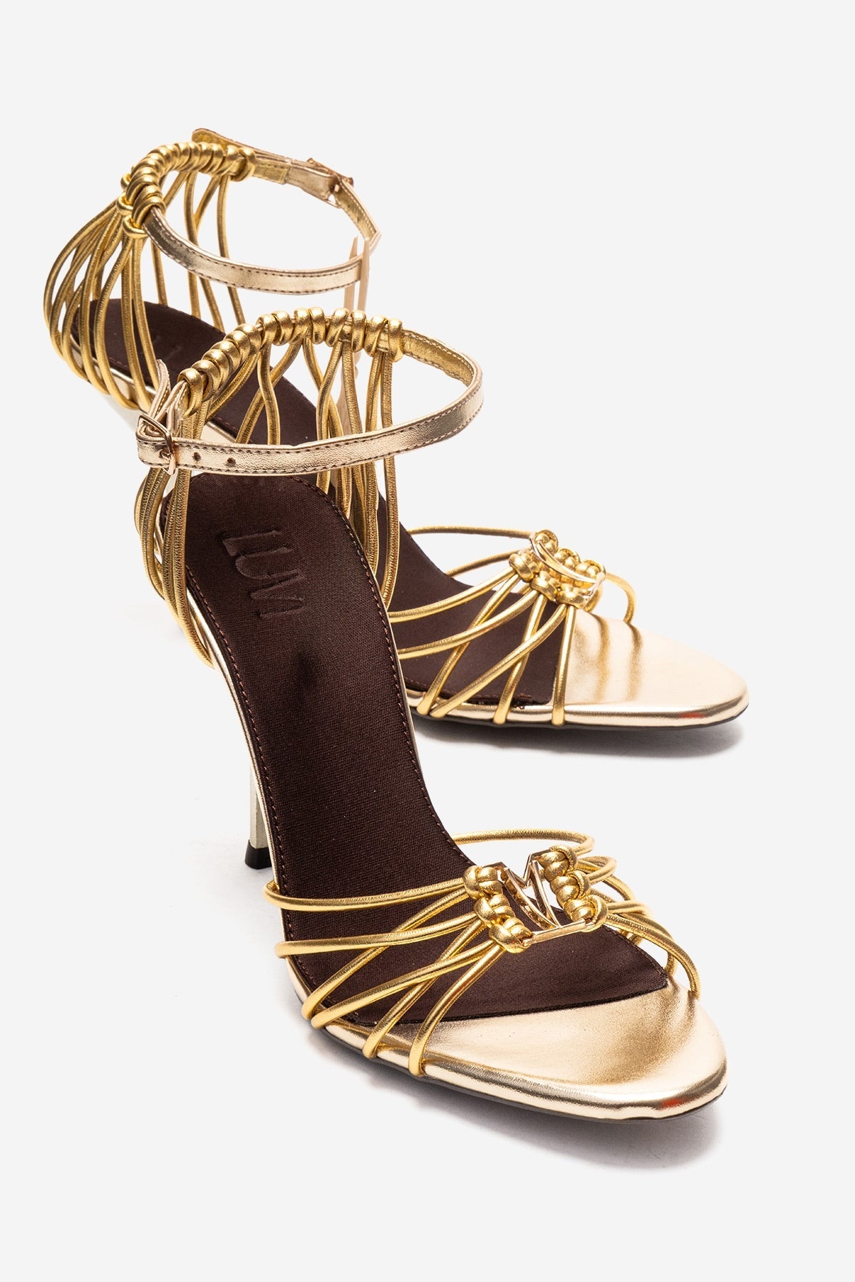 ARONA - Gold Stiletto Heel Shoe – front three-quarter view showing leather, metallic, gold, Vowalisse