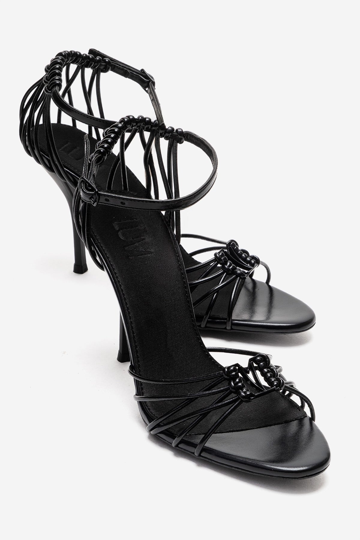 ARONA - Black Genuine Leather Stiletto Heel Shoe – front three-quarter view showing leather, black, Vowalisse