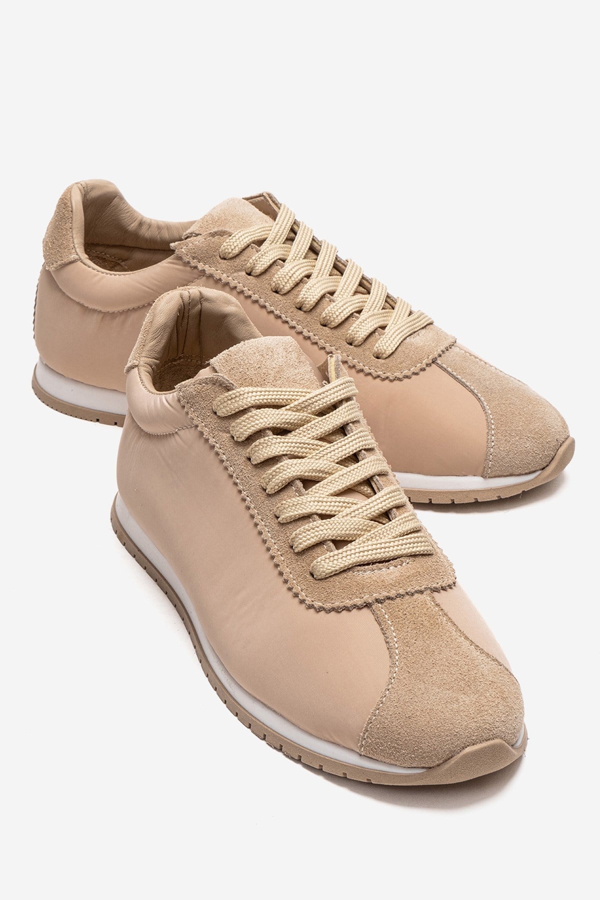 UNICA - Beige Genuine Leather Sneaker – front three-quarter view showing leather, suede, Vowalisse