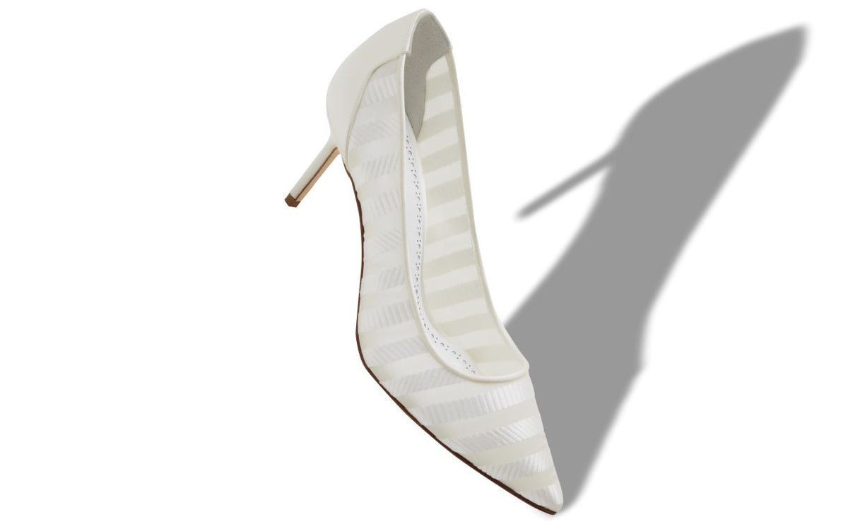 Odette Shine White Pointed Toe Pumps – front three-quarter view showing white pointed toe, Vowalisse