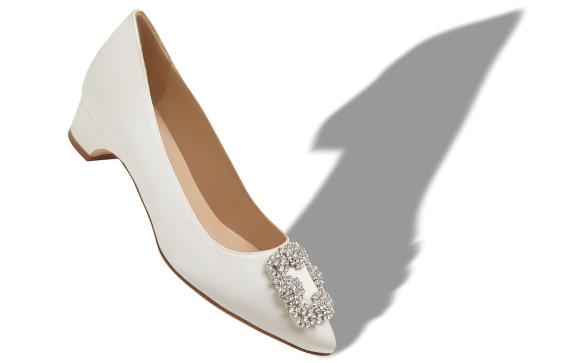 Leonora Halo White Jewel Buckle Pumps – front three-quarter view showing white jewel buckle, crystal buckle, almond toe…