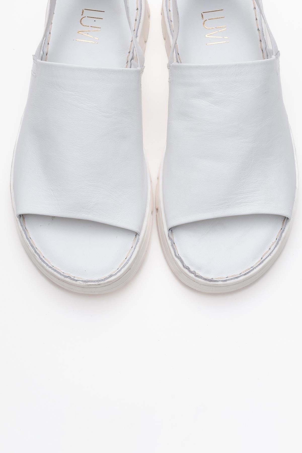 Londoi - White Elastic Strap Leather Sandal – side view showing leather, white, Vowalisse