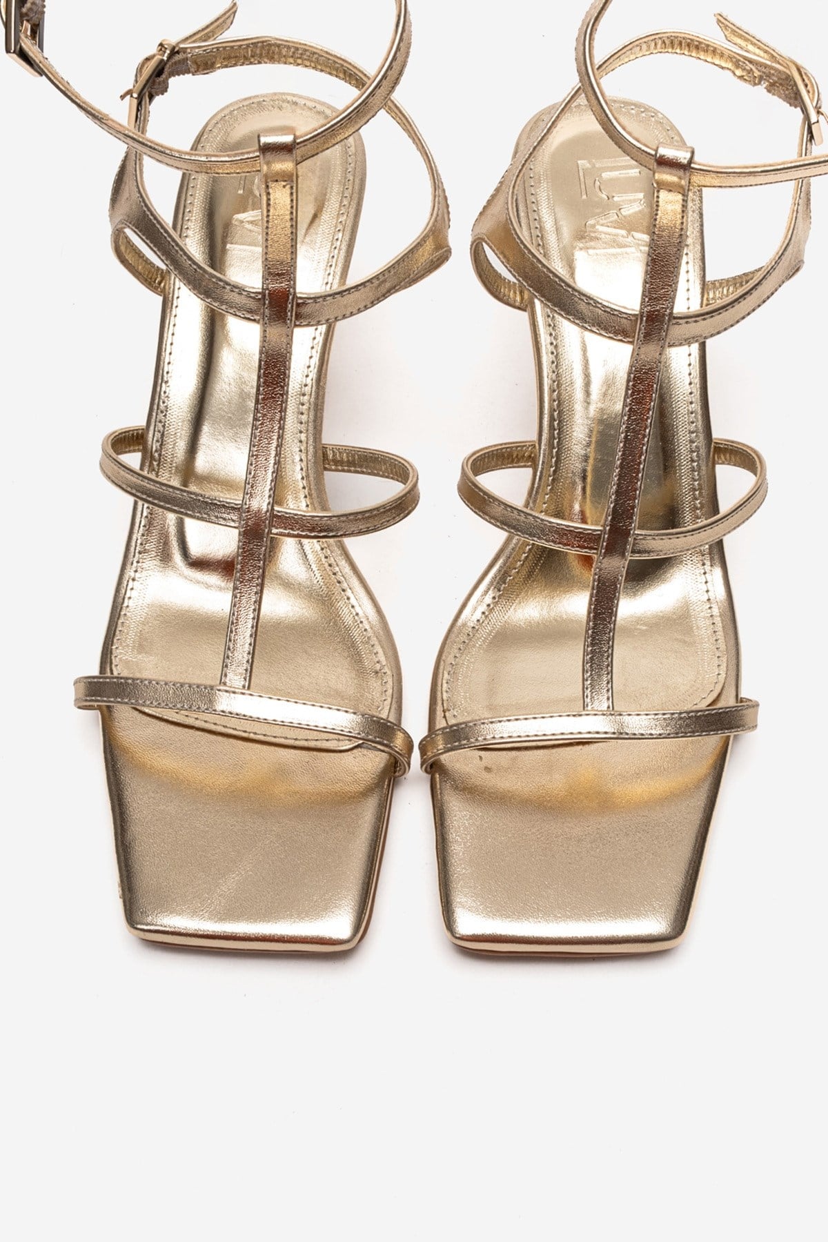 VIENTO - Gold Ankle-Strap Stiletto Pump – side view showing leather, gold, Vowalisse