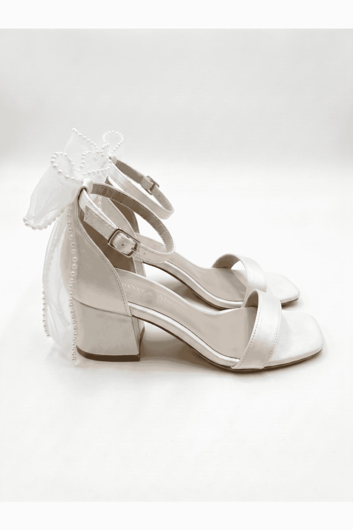 Floraya Opentoe Bow Detail Block Heel Bridal Sandals – heel view showing bow, lace, ivory, Vowalisse