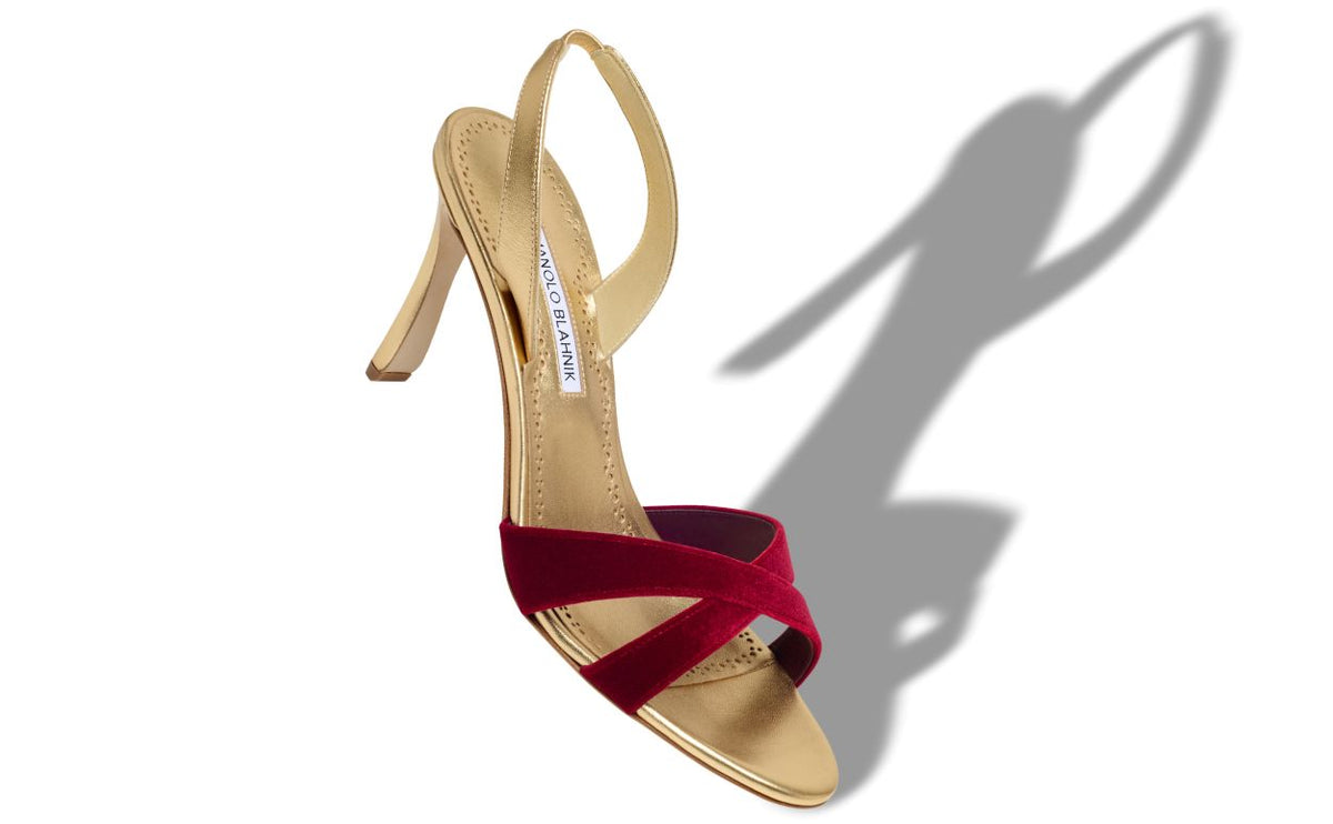 Adriana Muse Gold Crossover Slingbacks – front three-quarter view showing gold crossover, slingback, open toe, nappa…