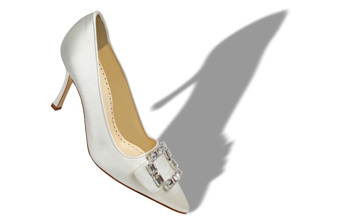 Clarisse Rose White Crystal Buckle Pumps – front three-quarter view showing white crystal buckle, pointed toe, satin…
