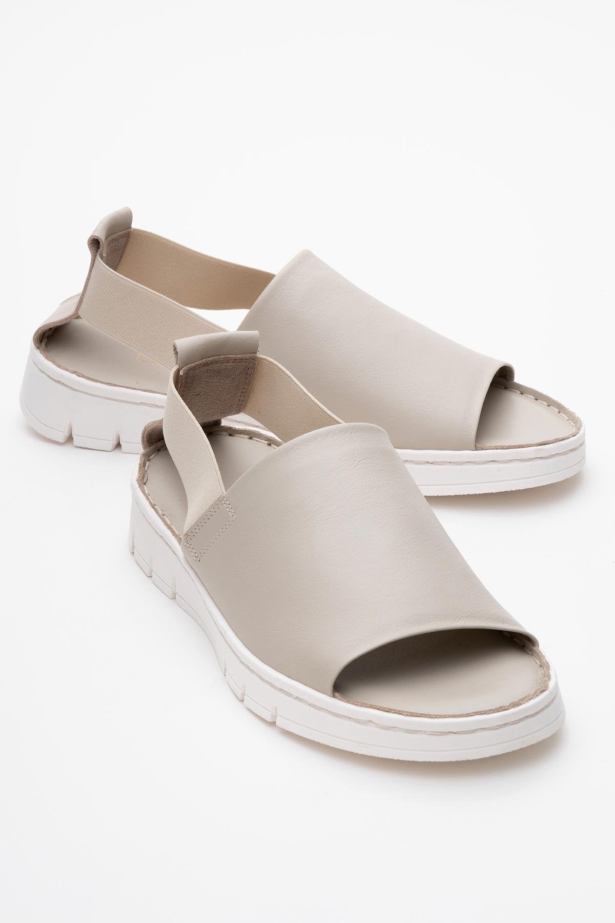 Londoi - Beige Elastic Strap Leather Sandal – front three-quarter view showing leather, Vowalisse