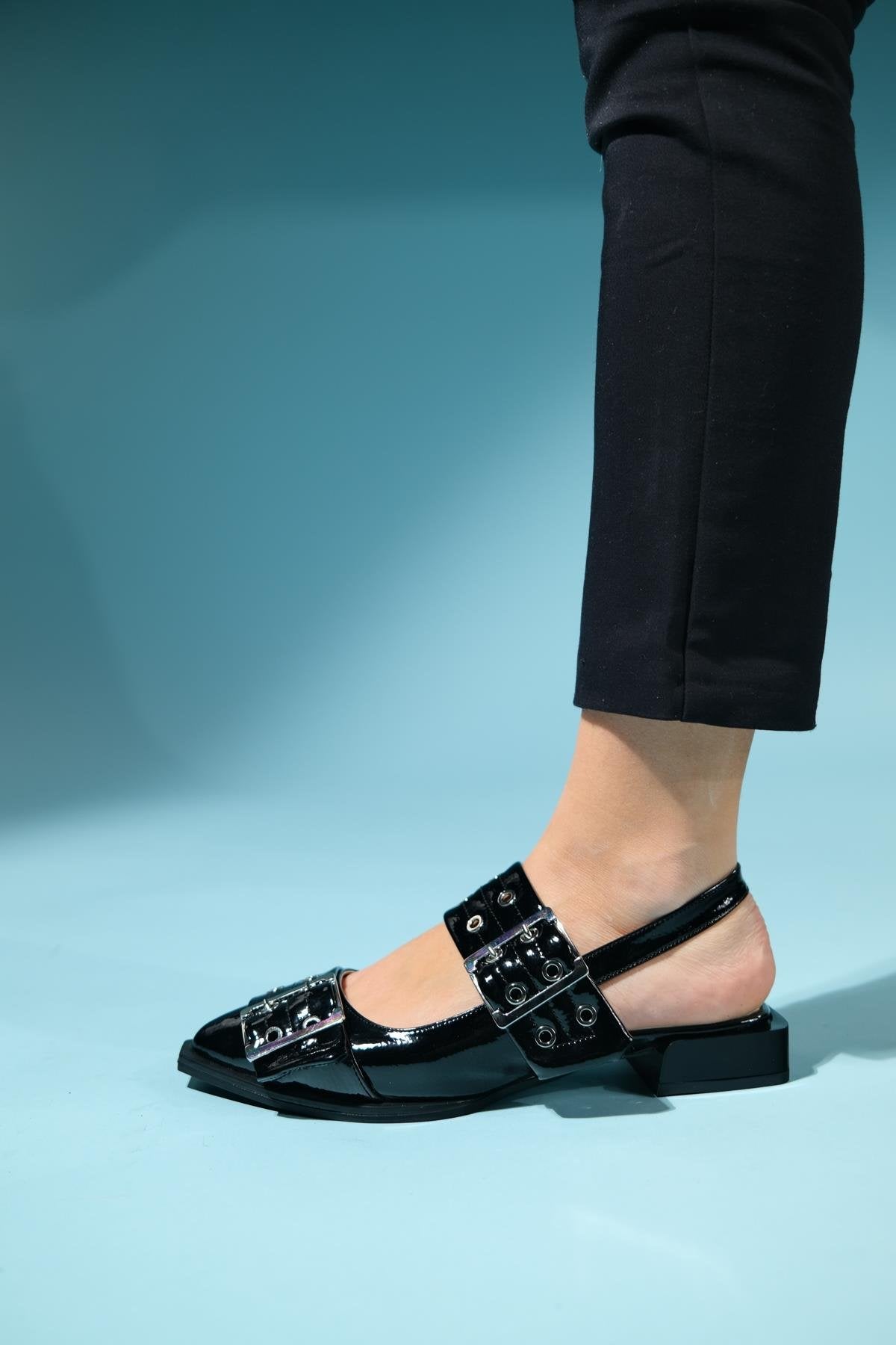 Paloma - Black Patent Silver Buckle Sandal – heel view showing leather, black, silver, Vowalisse