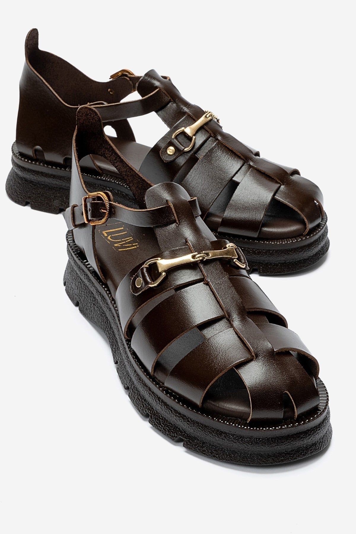 RIELA - Brown Genuine Leather Buckled Sandal – front three-quarter view showing leather, gold, Vowalisse
