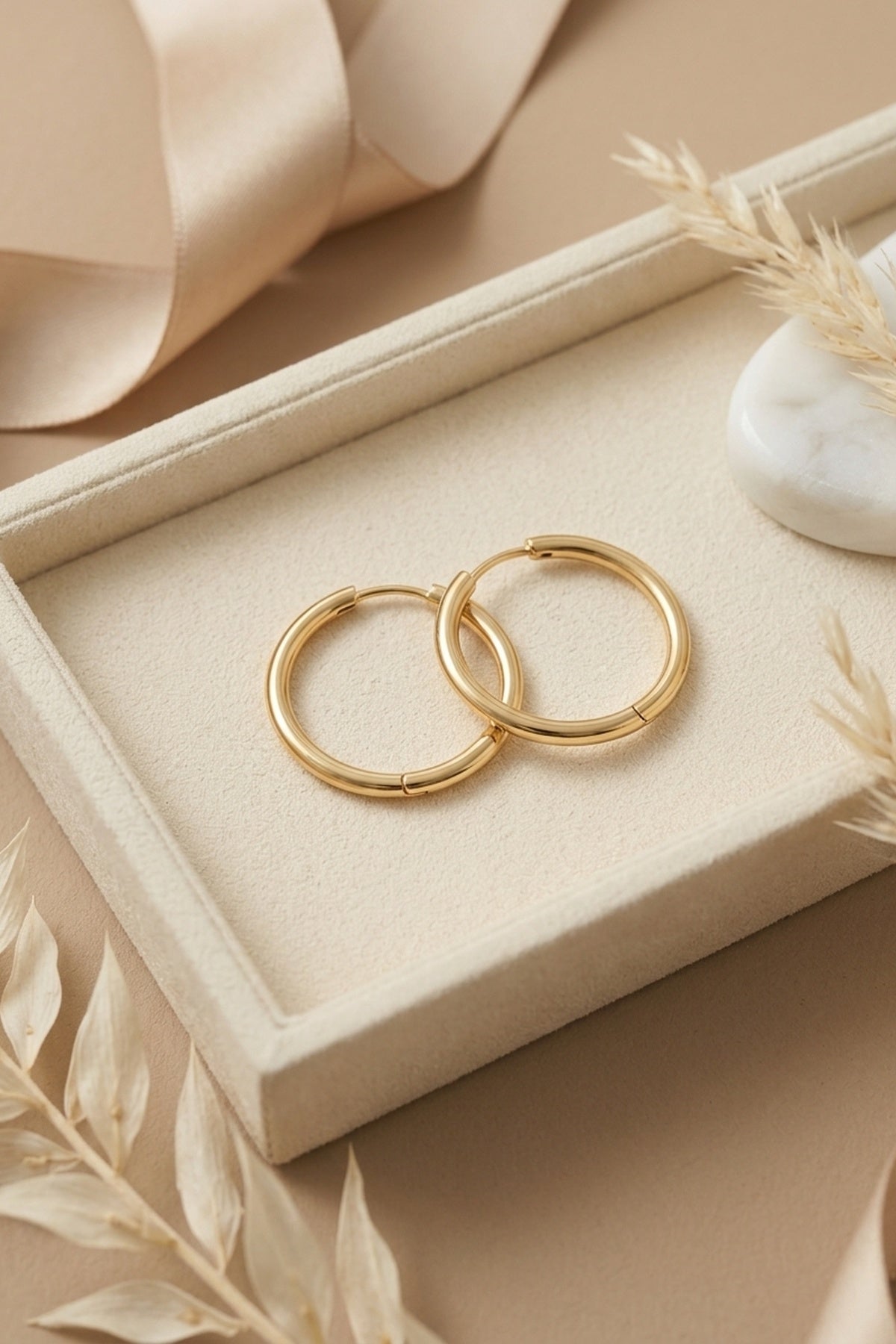 Estelle Classic 14k Gold Hoop Earrings – front three-quarter view showing gold, Vowalisse