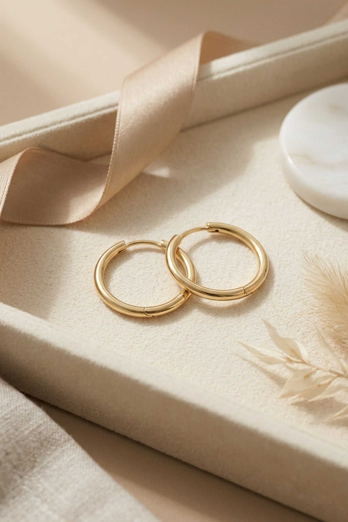 Audrey Classic 14k Gold Hoop Earrings – front three-quarter view showing gold, Vowalisse