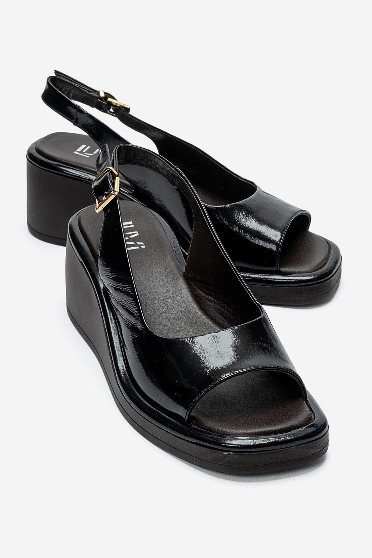 ORLENA - Black Genuine Leather Slingback Wedge Sandal – front three-quarter view showing leather, black, Vowalisse