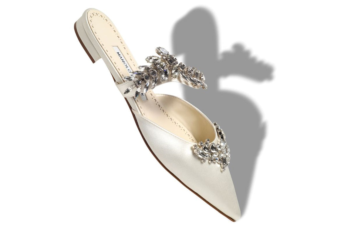Valentina Lace White Crystal Embellished Mules – front three-quarter view showing white crystal embellished, pointed toe…