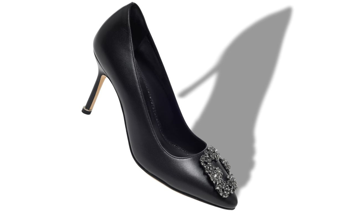 Delphine Muse Black Jewel Buckle Pumps – front three-quarter view showing black jewel buckle, crystal buckle, almond toe…