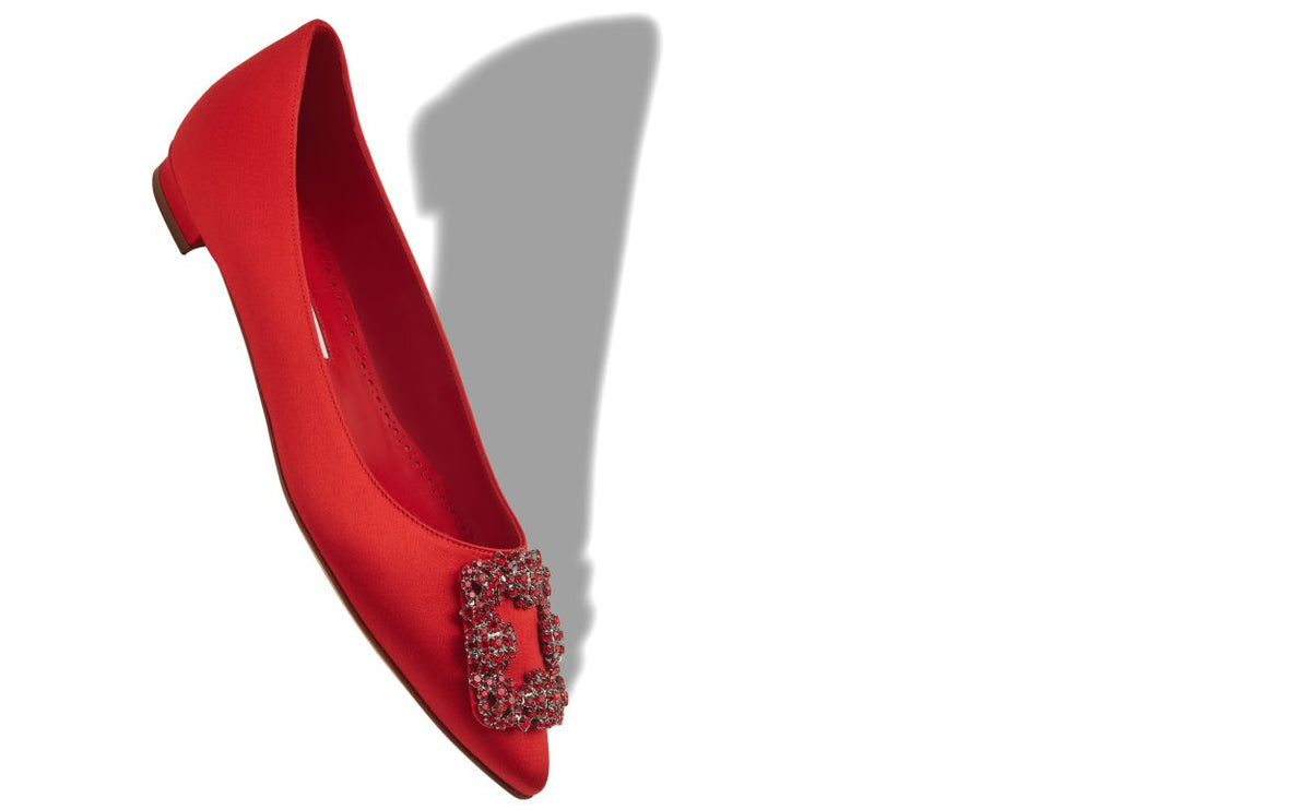 Aurelia Star Red Jewel Buckle Pumps – front three-quarter view showing red jewel buckle, crystal buckle, almond toe, satin…