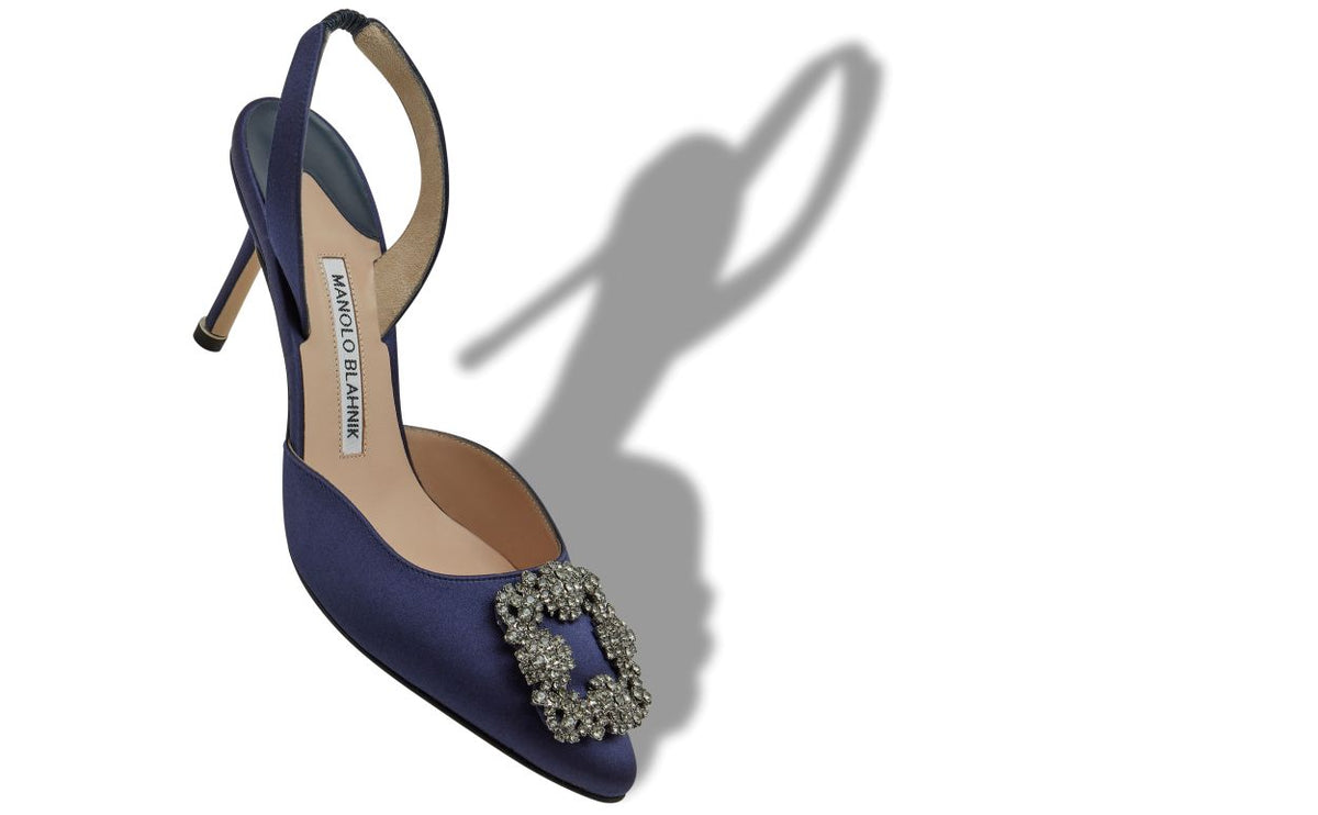 Evangeline Bloom Blue Jewel Buckle Slingbacks – front three-quarter view showing blue jewel buckle, crystal buckle, ankle…